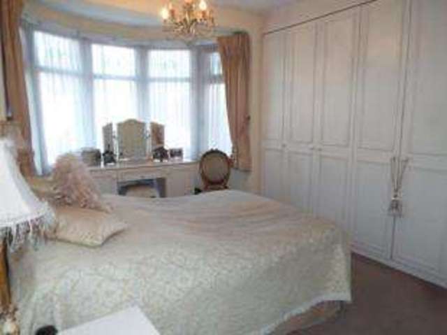  Image of 3 bedroom Terraced house for sale in Glenwood Gardens Ilford IG2 at Gants Hill Essex Redbridge, IG2 6XT