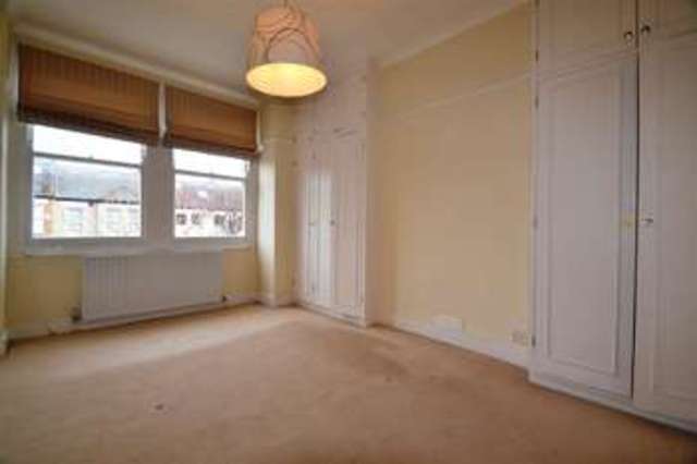  Image of 4 bedroom Terraced house to rent in Evelyn Road London SW19 at Haydons Road, SW19 8NU