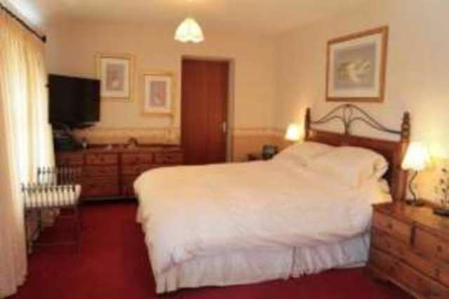  Image of 4 bedroom Detached house for sale in Itchenor Road Hayling Island PO11 at Hayling Island Hampshire Eastoke, PO11 9SN