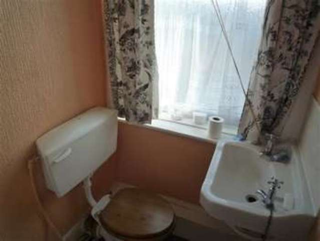  Image of 2 bedroom Terraced house for sale in Knowl Road Golcar Huddersfield HD7 at Golcar, HD7 4AN