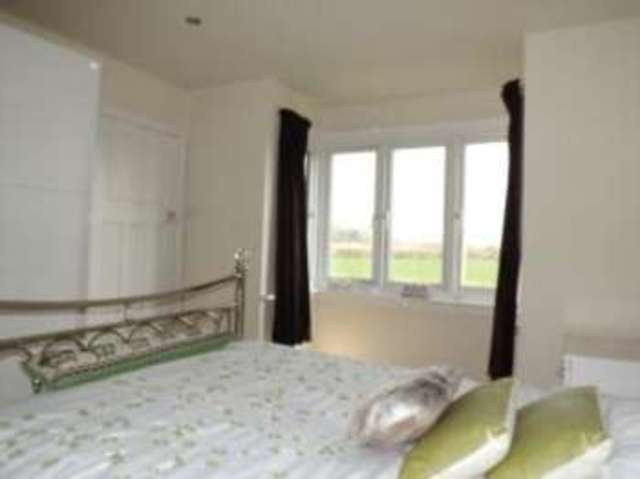  Image of 4 bedroom Detached house for sale in Salisbury Road Burton Christchurch BH23 at Burton Christchurch Winkton, BH23 7JT