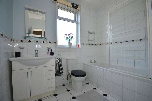  Image of 3 bedroom End of Terrace for sale in Highbury Gardens Ilford IG3 at Ilford Essex Ilford, IG3 8AA
