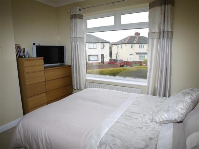  Image of 4 bedroom Detached house for sale in Swinnow Avenue Bramley Leeds LS13 at Bramley Leeds Pudsey, LS13 4NL
