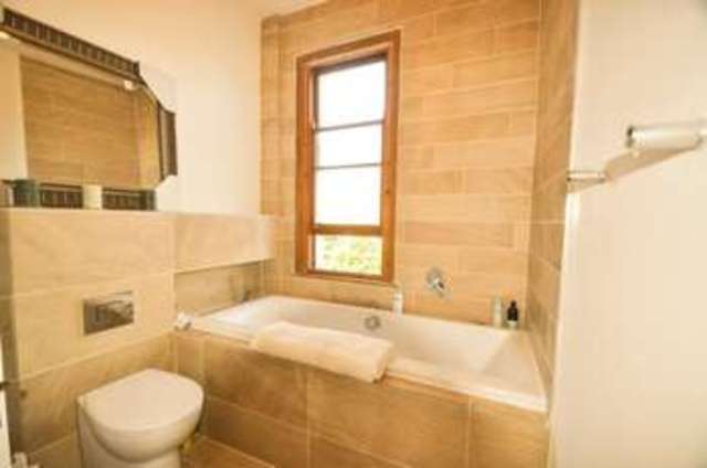  Image of 2 bedroom Detached house to rent in Mill Road London SW19 at London  Colliers Wood, SW19 2NE