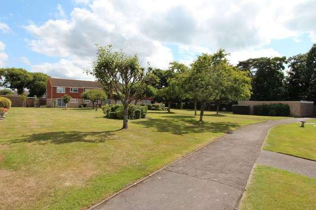  Image of 2 bedroom Ground Flat for sale in The Lawns Waterford Road Highcliffe Christchurch BH23 at Highcliffe Christchurch Dorset, BH23 5LF