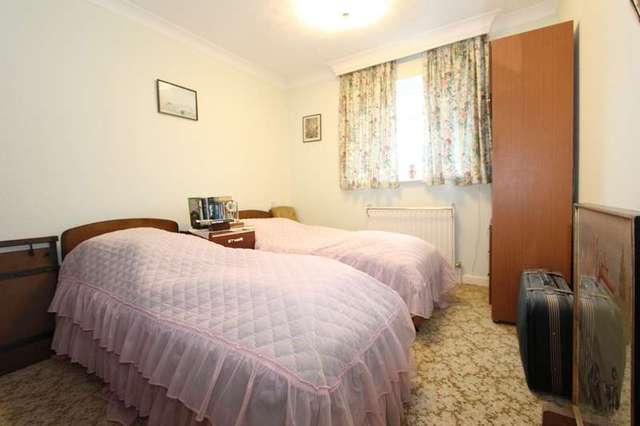  Image of 2 bedroom Ground Flat for sale in The Lawns Waterford Road Highcliffe Christchurch BH23 at Highcliffe Christchurch Dorset, BH23 5LF