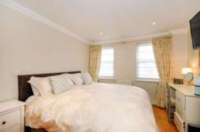  Image of 2 bedroom Flat for sale in High Street Esher KT10 at 76 High Street Esher Esher, KT10 9QS