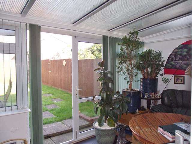  Image of 3 bedroom Terraced house for sale in Carisbrooke Court New Milton BH25 at Carisbrooke Court  NEW MILTON, BH25 5UE