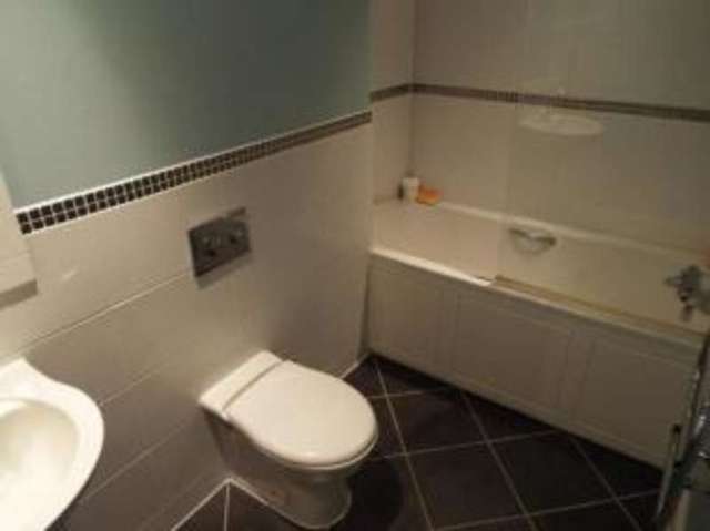 Image of 2 bedroom Flat for sale in Rosemount Avenue West Byfleet KT14 at Rosemount Avenue West Byfleet West Byfleet, KT14 6BD