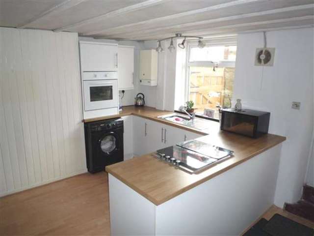  Image of 2 bedroom End of Terrace for sale in Scar Lane Milnsbridge Huddersfield HD3 at Quarmby, HD3 4PS