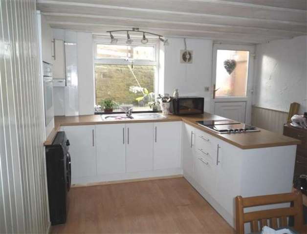  Image of 2 bedroom End of Terrace for sale in Scar Lane Milnsbridge Huddersfield HD3 at Quarmby, HD3 4PS