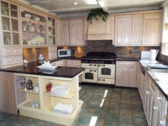  Image of 4 bedroom Bungalow for sale in Laburnham Gardens Cranham Upminster RM14 at Upminster  Cranham, RM14 1HU
