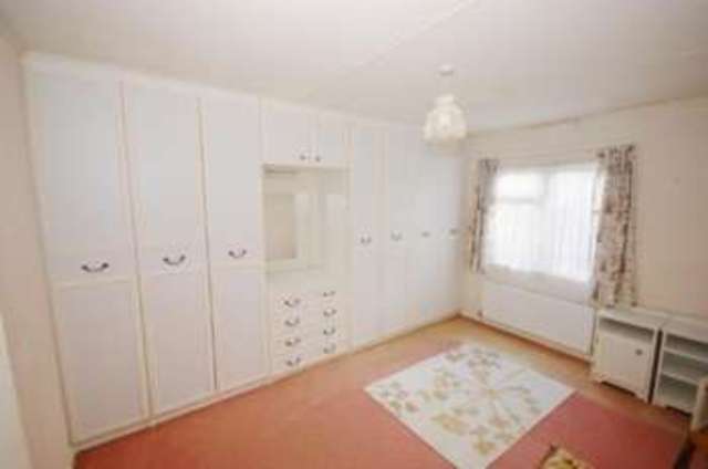  Image of 2 bedroom Bungalow for sale in Westwood Park Bashley Cross Road New Milton BH25 at New Milton  New Milton, BH25 5TB