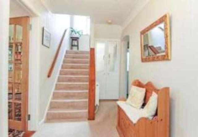  Image of 2 bedroom Bungalow for sale in Maundeville Road Christchurch BH23 at Christchurch Dorset Burton, BH23 2EN