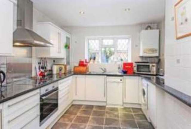  Image of 2 bedroom Bungalow for sale in Maundeville Road Christchurch BH23 at Christchurch Dorset Burton, BH23 2EN