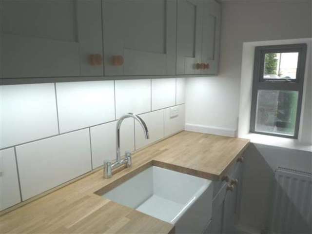  Image of 2 bedroom End of Terrace for sale in Cowlersley Lane Linthwaite Huddersfield HD4 at Milnsbridge, HD4 5UJ