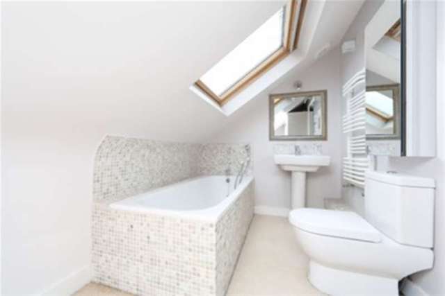  Image of 4 bedroom Detached house to rent in Southdean Gardens London SW19 at Southfields, SW19 6NU