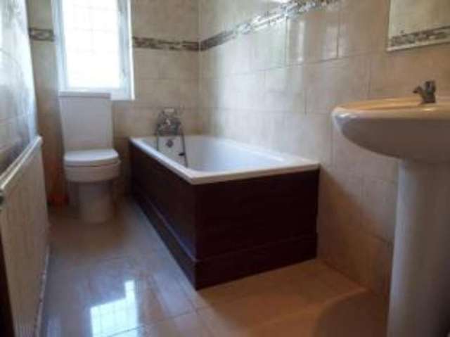  Image of 4 bedroom Terraced house for sale in Falmouth Gardens Ilford IG4 at Ilford  South Woodford, IG4 5JJ