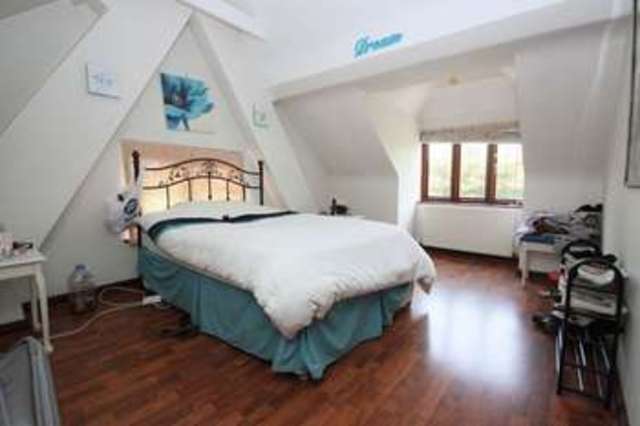  Image of 4 bedroom Detached house for sale in Tomswood Hill Ilford IG6 at Tomswood Hill  Chigwell, IG6 2QS