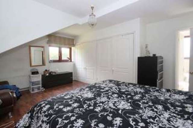  Image of 4 bedroom Detached house for sale in Tomswood Hill Ilford IG6 at Tomswood Hill  Chigwell, IG6 2QS