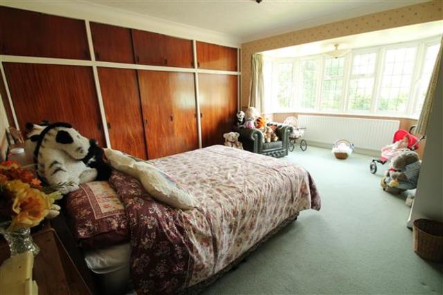  Image of 4 bedroom Detached house for sale in Stagbury Avenue Chipstead Coulsdon CR5 at Chipstead, CR5 3PA