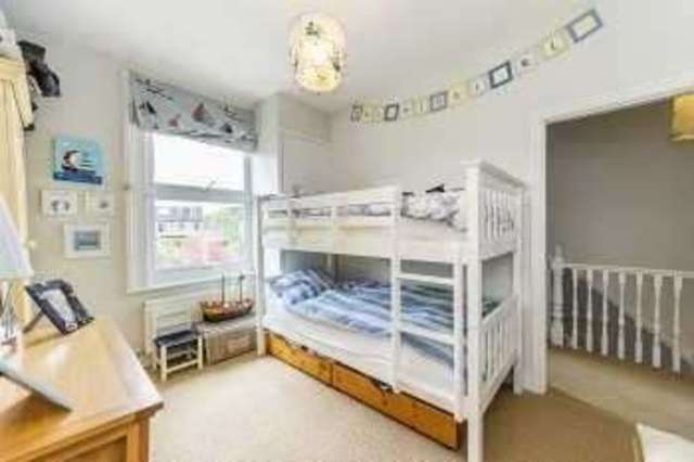  Image of 3 bedroom Terraced house for sale in Haydon Park Road London SW19 at Haydons Road, SW19 8JT