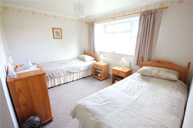  Image of 3 bedroom Detached house for sale in Honeypots Road Woking GU22 at Woking  Mayford, GU22 9QW