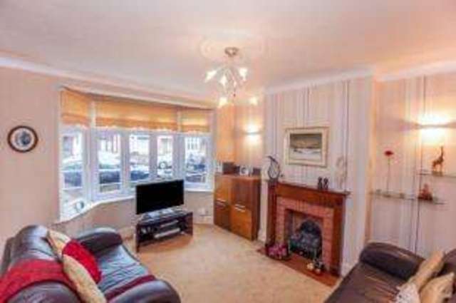  Image of 4 bedroom Terraced house for sale in Woodlands Avenue Chadwell Heath Romford RM6 at Romford  Marks Gate, RM6 6EA